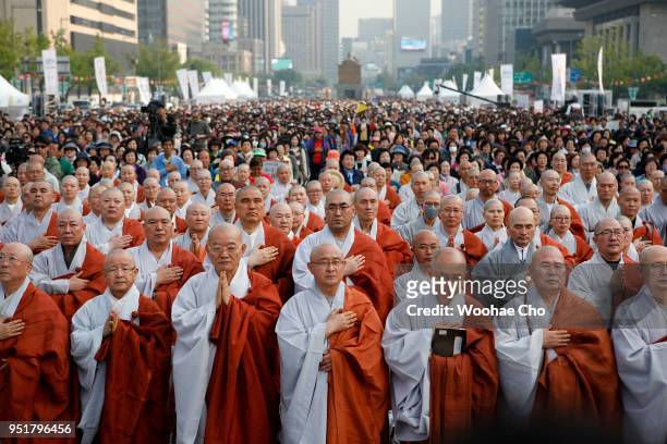 Thousands of South Korean Buddhists have a prayer service wishing for a successful Inter-Korean Summit and peace for the country on April 27, 2018 in...