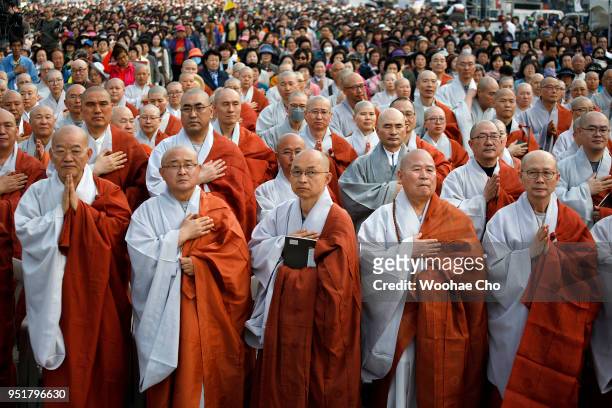 Thousands of South Korean Buddhists have a prayer service wishing for a successful Inter-Korean Summit and peace for the country on April 27, 2018 in...