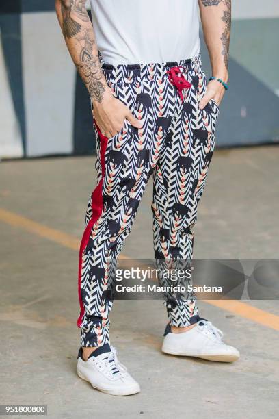 Visitor poses, fashion detail pants with elephants during Sao Paulo Fashion Week N45 SPFW Summer 2019 at Brazilian Cultures Engineer Armando de...