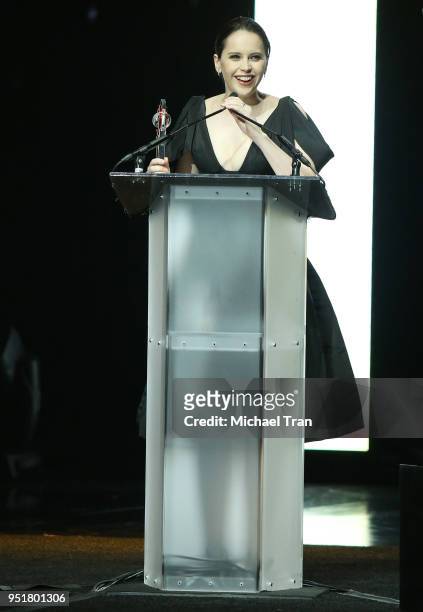 Felicity Jones accepts the Award of Excellence in Acting onstage during the CinemaCon presents The 2018 Big Screen Achievement Awards held at The...