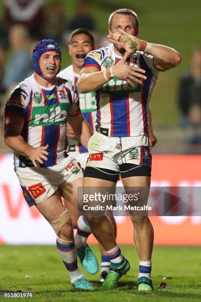 Nathan Ross of the Knights celebrates scoring a try during the Round eight NRL match between the Manly-Warringah Sea Eagles and the Newcastle Knights...