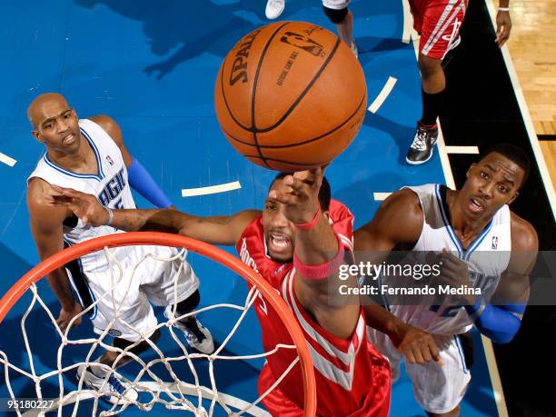 Tracy McGrady of the Houston Rockets shoots a layup against the Orlando Magic during the game on December 23, 2009 at Amway Arena in Orlando,...