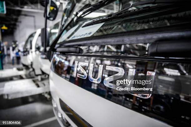 Decal sits on the cabin of a Isuzu NPR N-Series truck on the assembly line inside the Isuzu East Africa Ltd. Plant in Nairobi, Kenya, on Thursday,...