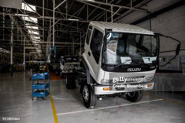 Isuzu FSR 33H F-Series trucks stand on the assembly line inside the Isuzu East Africa Ltd. Plant in Nairobi, Kenya, on Thursday, April 26, 2018....