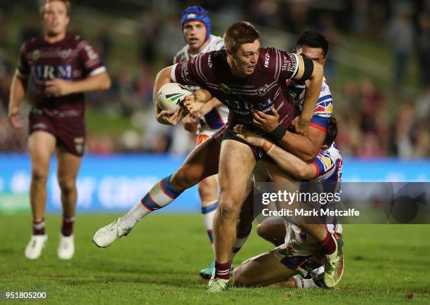 Shaun Lane of the Sea Eagles is tackled during the Round eight NRL match between the Manly-Warringah Sea Eagles and the Newcastle Knights at...