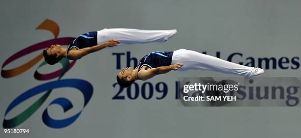 Portugal's Diogo Ganchinho and Nuno Merino compete in a trampoline gymnastics event at the World Games in Kaohsiung on July 20, 2009. The World Games...
