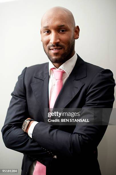 French footballer Nicolas Anelka poses at the Francais Of The Year awards in London on December 17, 2009. The event is held yearly for French...