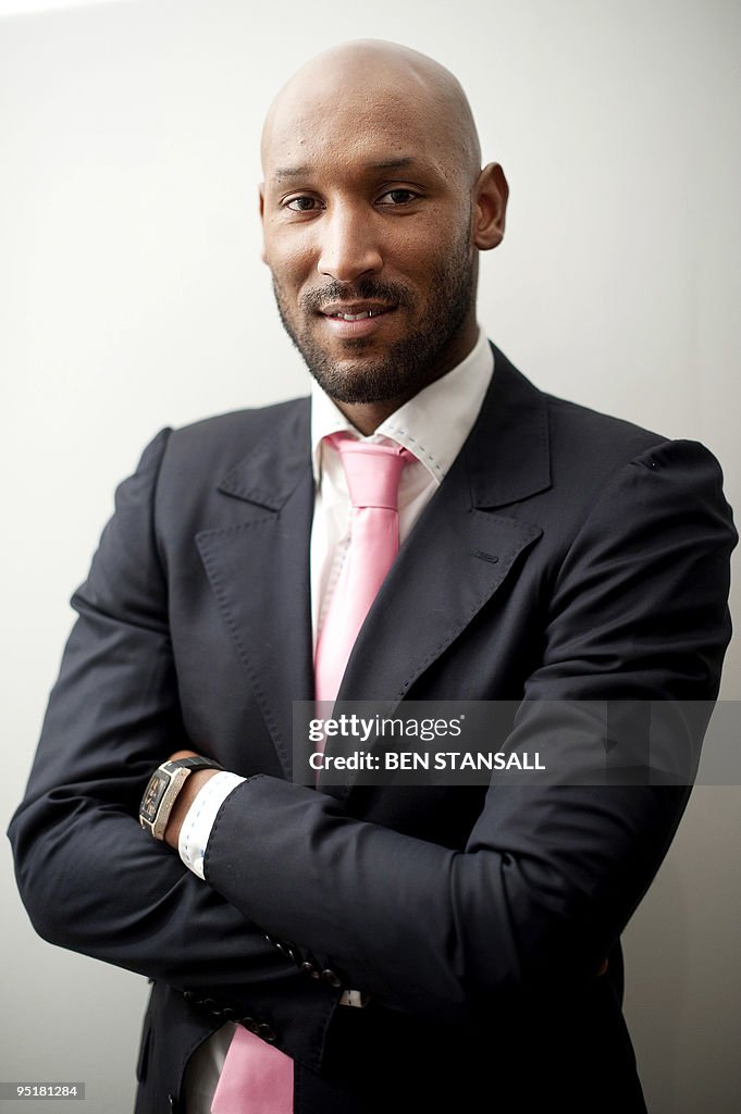 French footballer Nicolas Anelka poses a