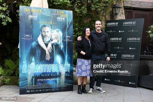Director Lynne Ramsay and actor Joaquin Phoenix attend 'A Beautiful Day' photocall at Hotel De Russie on April 27, 2018 in Rome, Italy.