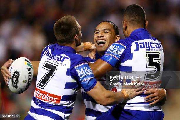 Will Hopoate of the Bulldogs celebrates scoring a try with team mates during the NRL round eight match between the Penrith Panthers and Canterbury...