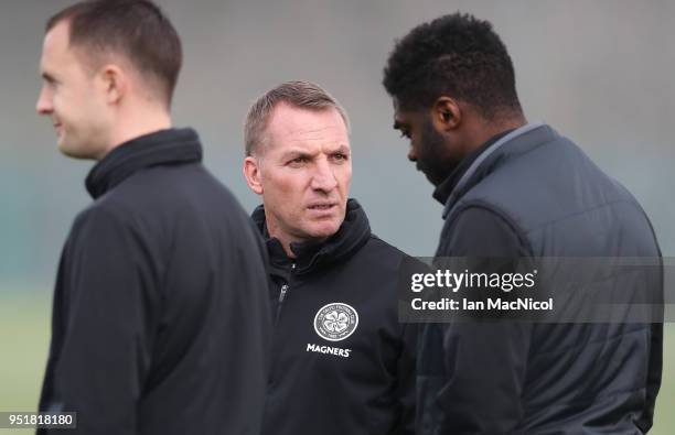 Celtic manager Brendan Rodgers speaks with Technical Assistant Kolo Toure during a training session at Lennoxtown Training Centre on April 27, 2018...