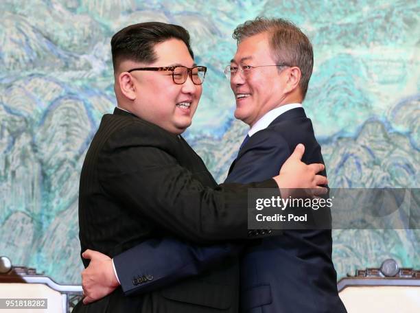 North Korean leader Kim Jong Un and South Korean President Moon Jae-in embrace after signing the Panmunjom Declaration for Peace, Prosperity and...