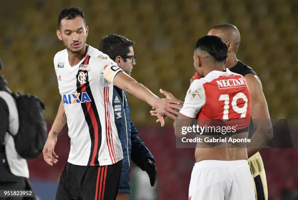 Wilson Morelo of Santa Fe shakes hands with Rever of Flamengo after a match between Independiente Santa Fe and Flamengo as part of Copa CONMEBOL...