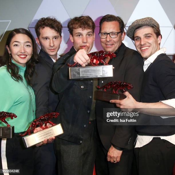 The award winner Mia Spengler, Jonathan Berlin and Jonas Dassler with Robert Poelzer, chief editor Bunte magazine during the New Faces Award Film at...