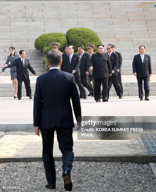 South Korea's President Moon Jae-in waits before the Military Demarcation Line for North Korea's leader Kim Jong Un ahead of the inter-Korean summit...