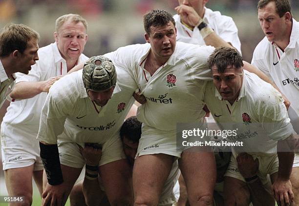 Phil Vickery, Mark Regan, and Jason Leonard of England line up as the front row during the Lloyds TSB Six Nations 2001 Championship match against...