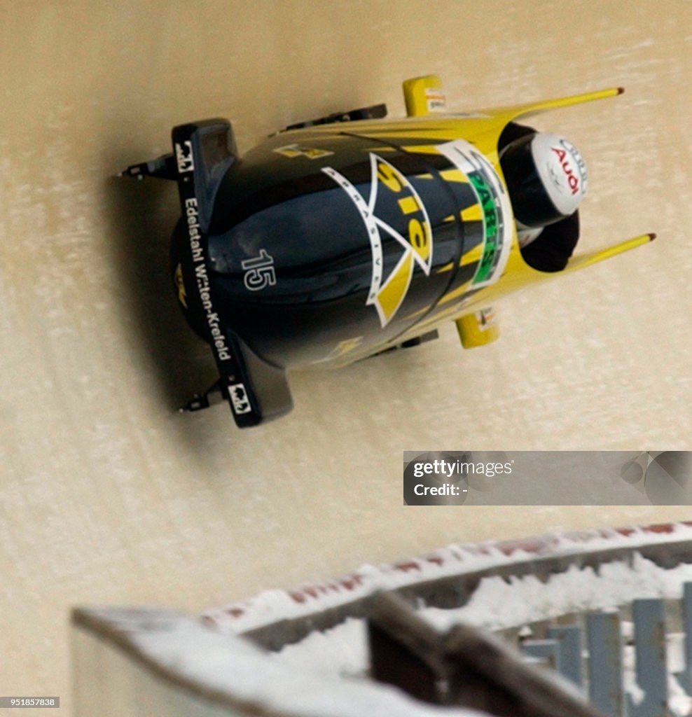 Christian Ruegg The Switzerland-3 bobsled of Ivo Ruegg and Christian Aebli take a ...