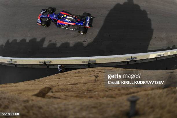 Toro Rosso's French driver Pierre Gasly steers his car during the first practice session ahead of the Formula One Azerbaijan Grand Prix in Baku on...