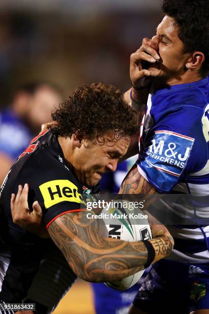 James Fisher-Harris of the Panthers is tackled Jeremy Marshall-King of the Bulldogs during the NRL round eight match between the Penrith Panthers and...