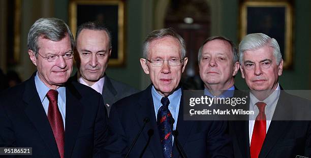 Senate Majority Leader Harry Reid speaks amidst , Sen. Max Baucus , Sen. Charles Schumer , Sen. Reid, Sen. Richard Durbin , Sen. Christopher Dodd...