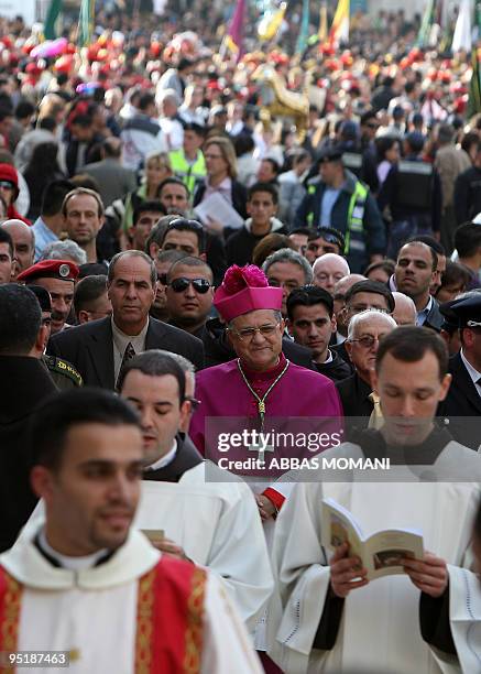 The head of the Roman Catholic Church in the Holy Land, the Latin Patriarch of Jerusalem Fuad Twal, arrives at the Church of the Nativity as...