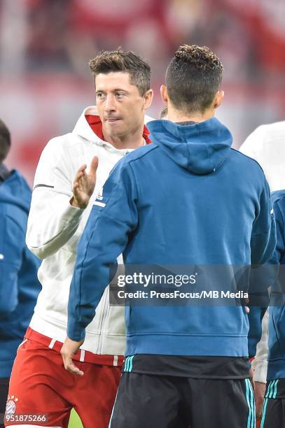 Robert Lewandowski of Bayern Muenchen greets with Cristiano Ronaldo of Real Madrid during the UEFA Champions League Semi Final First Leg match...