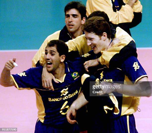 Players on the Brazilian volleyball team celebrate their victory over the United States team in the "Luna Park" stadium in Buenos Aires, Argentina....