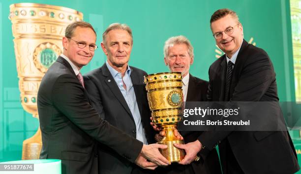 Michael Mueller, mayor of Berlin, former football players Karl-Heinz Koerbel and Paul Breitner and Reinhard Grindel, president of the German Football...