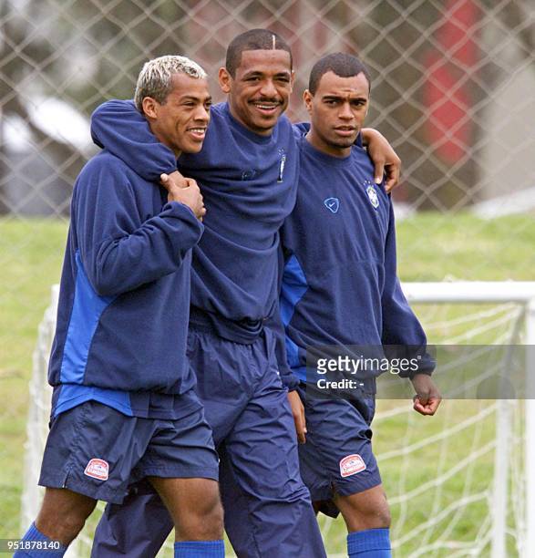 Marecelinho Paraiba, Vampeta and Denilson , who are all players on the brazilian soccer team, 06 October 2001 during practice in the Central Athletic...
