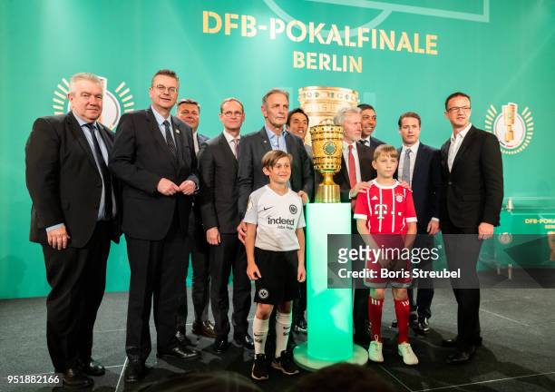 Vice president Peter Frymuth, Reinhard Grindel, president of the German Football Association , Andreas Geisel, Senator of Interior and Sport of...
