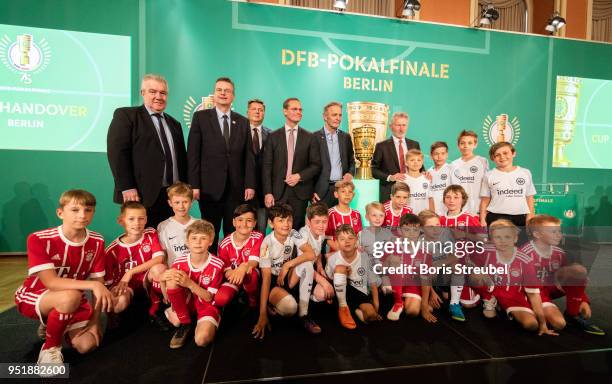 Vice president Peter Frymuth, Reinhard Grindel, president of the German Football Association , Andreas Geisel, Senator of Interior and Sport of...