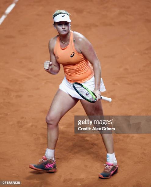 CoCo Vandeweghe of the United States celebrates after defeating Simona Halep of Romania during day 5 of the Porsche Tennis Grand Prix at...