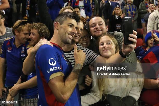 Jason Hoffman of the Jets takes a selfie with fans during the A-League Semi Final match between the Newcastle Jets and Melbourne City at McDonald...