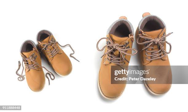 father and son's walking boots, healthy lifestyle - suede boot stock pictures, royalty-free photos & images