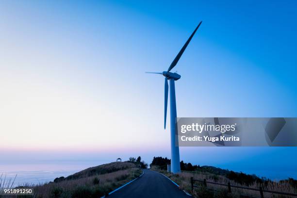 wind turbine on a hill - wind power station stock pictures, royalty-free photos & images