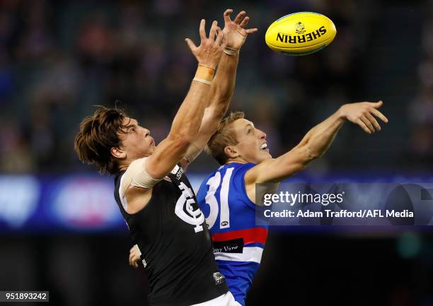 Caleb Marchbank of the Blues and Bailey Dale of the Bulldogs compete for the ball during the 2018 AFL round six match between the Western Bulldogs...