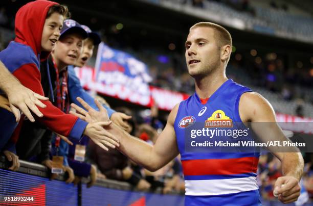 Caleb Daniel of the Bulldogs celebrates during the 2018 AFL round six match between the Western Bulldogs and the Carlton Blues at Etihad Stadium on...
