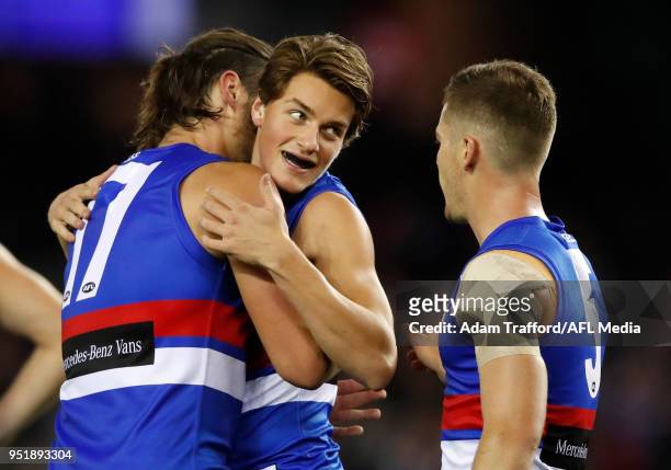 Patrick Lipinski of the Bulldogs celebrates a goal with Tom Boyd of the Bulldogs during the 2018 AFL round six match between the Western Bulldogs and...