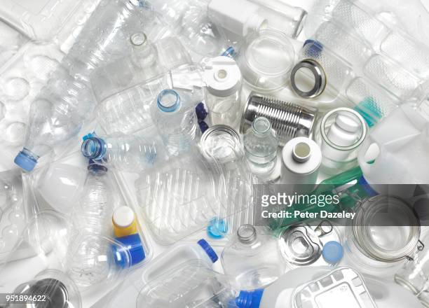 mixed recycling glass, plastic and metal - mixed recycling bin stock pictures, royalty-free photos & images