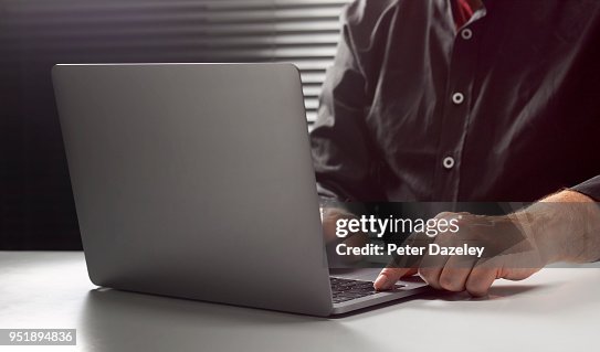 HACKER ON COMPUTER AT NIGHT HACKER ON COMPUTER AT NIGHT