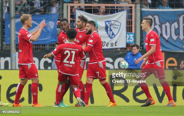 Halil Altintop of Kaiserslautern celebrates after scoring his team`s first goal with Gino Fechner, Phillipp Mwene and Brandon Borrello of...