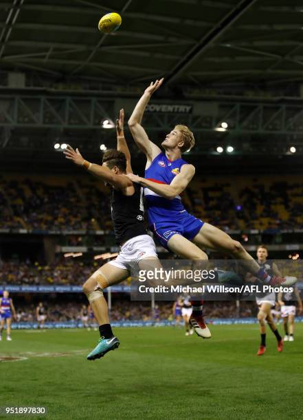 Tim English of the Bulldogs and Levi Casboult of the Blues compete for the ball during the 2018 AFL round six match between the Western Bulldogs and...