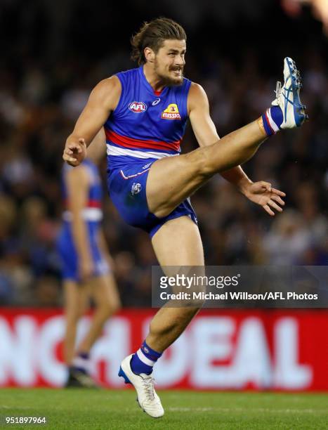 Tom Boyd of the Bulldogs kicks the ball during the 2018 AFL round six match between the Western Bulldogs and the Carlton Blues at Etihad Stadium on...