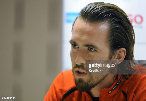 Austria's Christian Fuchs talks during a press conference on October 11 in Brussels on the eve of the Euro 2010 Group A qualification match between...