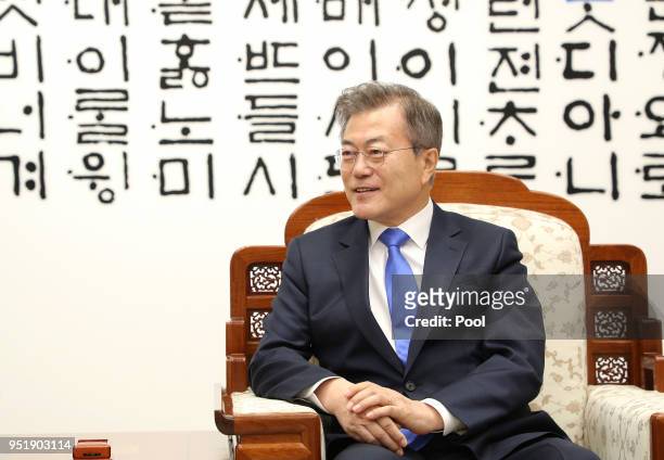 North Korean leader Kim Jong Un and South Korean President Moon Jae-in are in talks during the Inter-Korean Summit on April 27, 2018 in Panmunjom,...