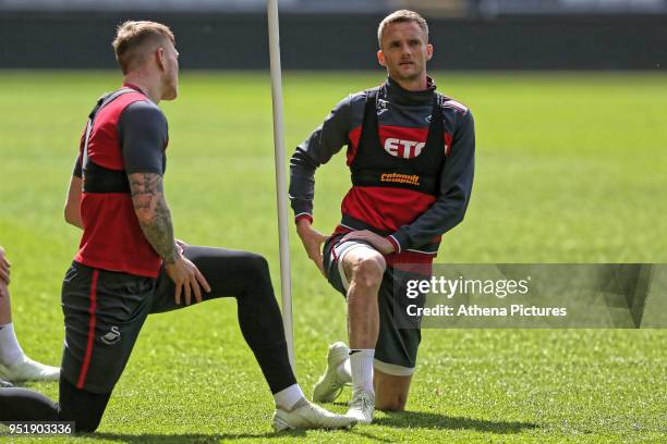 Alfie Mawson and Andy King in action during the Swansea City Training at The Liberty Stadium on April 26, 2018 in Swansea, Wales.