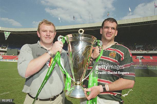 Leicester coach Dean Richards and Leicester captain Martin Johnson celebrate victory after the Heineken Cup Final 2001 against Stade Francais played...