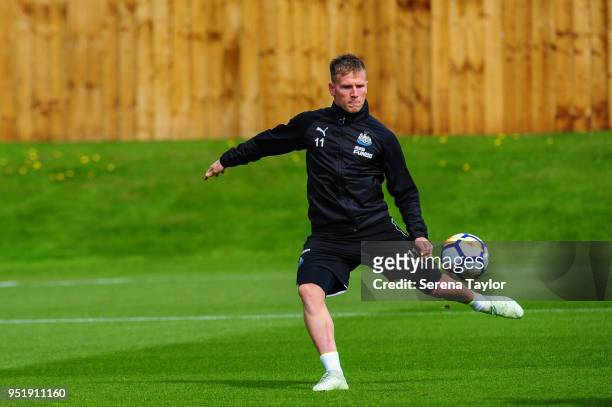 Matt Ritchie strikes the ball during the Newcastle United Training Session at the Newcastle United Training Centre on April 27 in Newcastle upon...