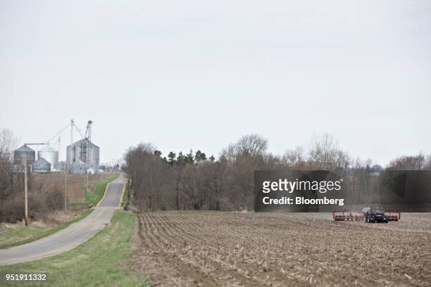 Case IH Agricultural Equipment Inc. Tractor pulls a planter through a field as corn is planted in Princeton, Illinois, U.S., on Tuesday, April 24,...