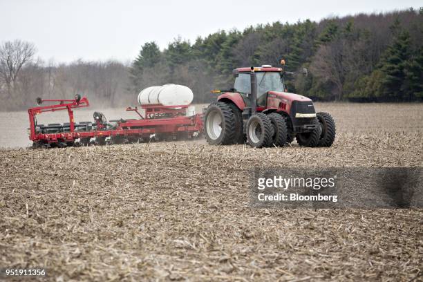 Case IH Agricultural Equipment Inc. Tractor pulls a planter through a field as corn is planted in Princeton, Illinois, U.S., on Tuesday, April 24,...